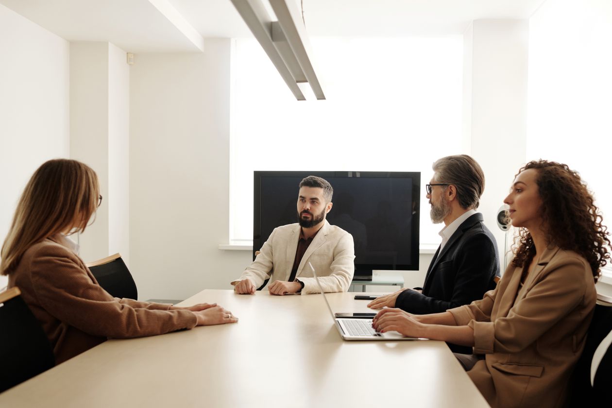 Multiple stakeholders discussing a vendor selection decision